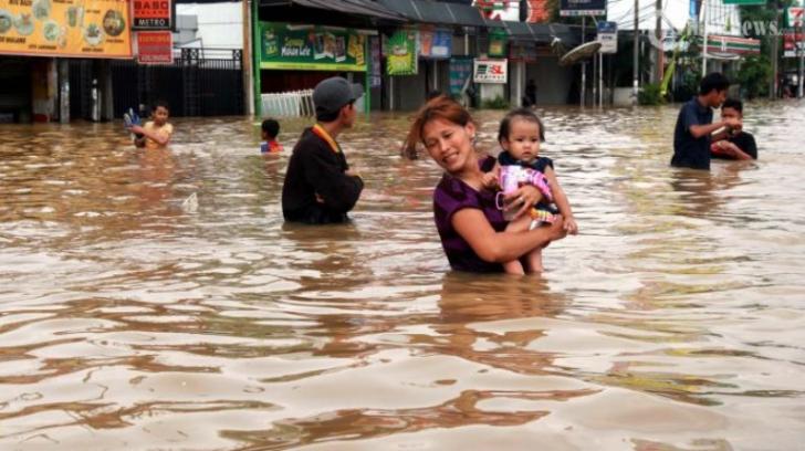 Banjir yang merendam Desa Buluh Cina di Kecamatan Siak Hulu, Kabupaten Kampar, Riau