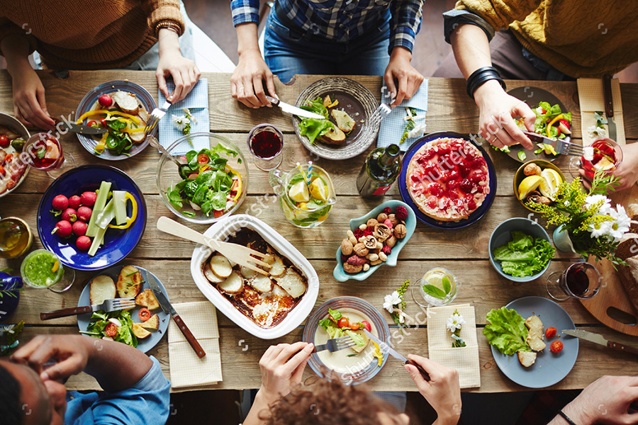 stock-photo-top-view-of-friends-having-lunch-427193734