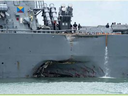 Guided-missile destroyer USS John S. McCain (DDG 56) steers towards Changi naval base in Singapore