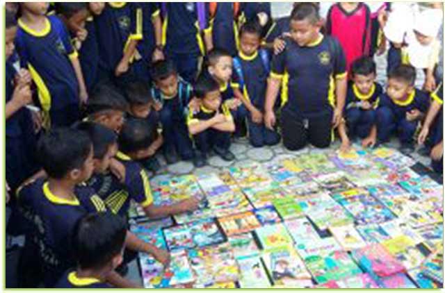 Bhabinkamtibmas Kelurahan Darussalam Hadirkan Perpustakaan Keliling