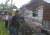 Ketua RT 002, Atan Yahya, dan tokoh masyarakat Dwikora, Wahid, beserta sejumlah warga saat menerangkan kondisi pembangunan, Jumat (26/10/18).