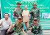 Penyerahan bantuan sembako dari koramil 02 Tarempa