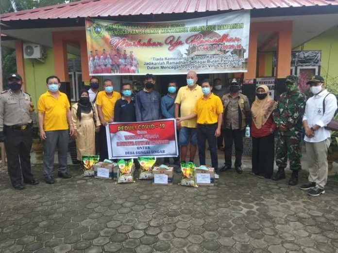 Yayasan Dharma Shanti Kundur Serahkan Bantuan Paket Bahan Pokok