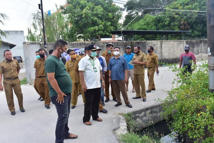 tinjau proyek normalisasi drainase KN