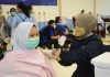 Vaksinasi massal pekerja di Muka Kuning