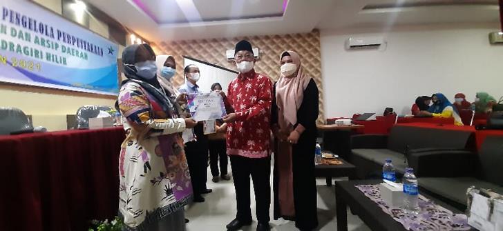 Kepala Dinas Perpustakaan dan Arsip Daerah (DPAD) Inhil, H Yulizal