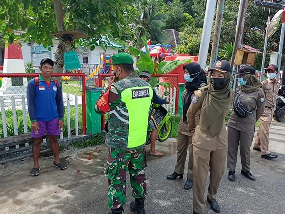 Tingkatkan Upaya Pemutusan Rantai Covid 19, Koramil 02 Tarempa dan Satpol PP laksanakan operasi Yustisi