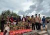 Pengurus Kwartir Cabang Gerakan Pramuka Karimun, saat di dusun III pulau Manda, Desa Ngal