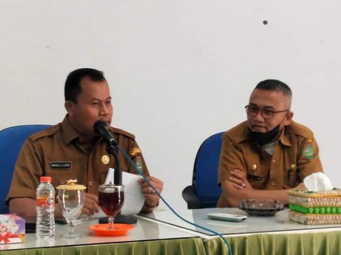 Bupati Asahan diwakili Asisten Ekonomi Pembangunan didampingi Kadis Lingkungan Hidup Kabupaten Asahan resmi membuka kegiatan sosialisasi