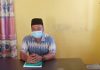 Kades Penarah, Kecamatan Belat, Awaludin, di ruang kerjanya.