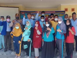 Foto bersama usai vaksinasi, sebelum pengukuhan HNSI