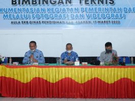 Kadis Kominfo Kabupaten Asahan sampaikan laporannya pada acara Bimbingan Teknis Pendokumentasian Kegiatan Pemerintah Daerah Melalui Fotografi dan Videografi Tahun 2022