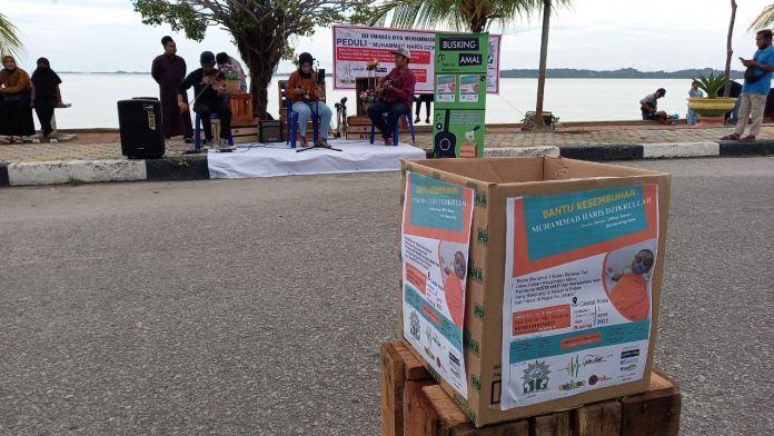 KN busking amal
