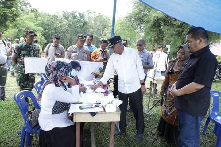 Bupati Asahan Tinjau Pelaksanaan Pilkades di Kecamatan Buntu Pane dan Simpang Empat