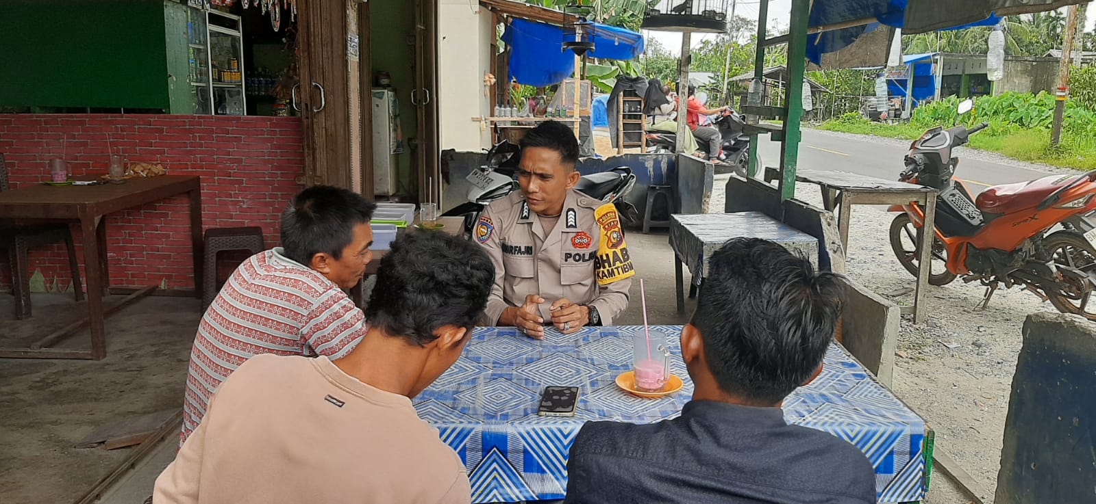 Jelang Pilkada, Bripka Nurfajri Lakukan Cooling System di Desa Pulau Palas