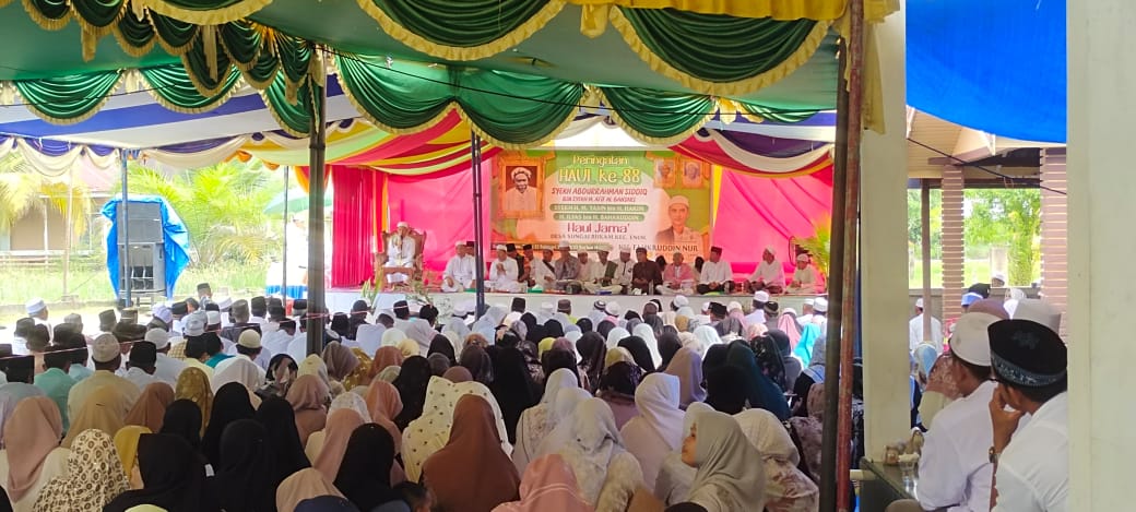 Babinsa Serda Niko Arisandi Hadiri Haul Syekh Abdurrahman Siddiq ke-88 dan Haul Jama’ di Desa Sungai Rukam